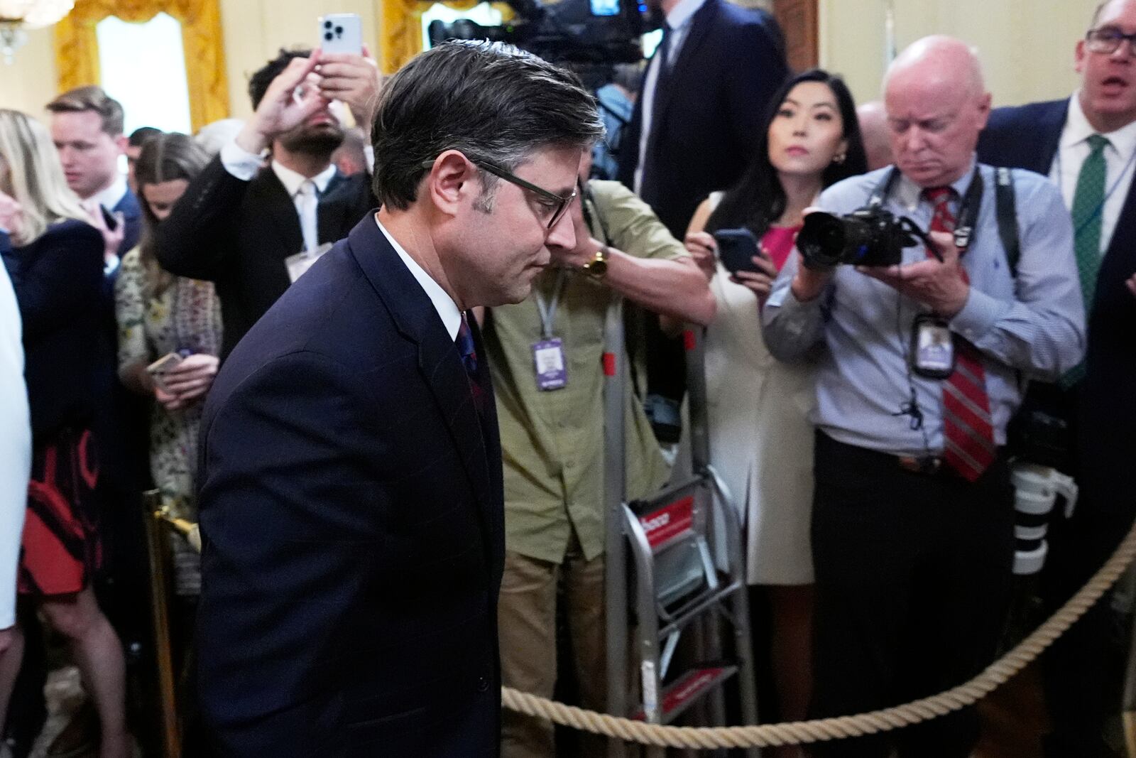 House Speaker Mike Johnson, R-La., departs after President Donald Trump signed a bill blocking California's rule banning the sale of new gas-powered cars by 2035, at an event in the East Room of the White House, Thursday, June 12, 2025, in Washington. (AP Photo/Alex Brandon)
