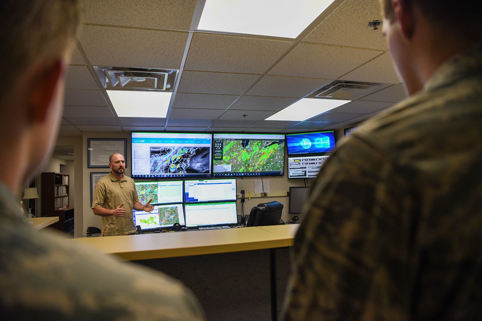 Zach Grandin, an 88th Operations Support Squadron weather technician, gives a brief description of what he does to cadets from the Civil Air Patrol’s 037 Wright-Patterson Composite Squadron on June 29 at Wright-Patterson Air Force Base. U.S. AIR FORCE PHOTO/AIRMAN 1ST CLASS ALEXANDRIA FULTON