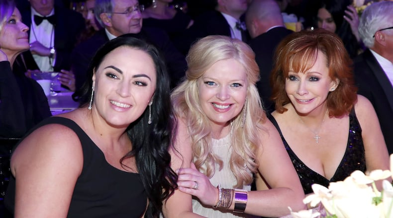 Calamity McEntire, actress Melissa Peterman and host Reba McEntire attend Muhammad Ali’s Celebrity Fight Night XXIII at the JW Marriott Desert Ridge Resort & Spa on March 18, 2017 in Phoenix, Arizona. (Photo by Jonathan Leibson/Getty Images for Celebrity Fight Night)