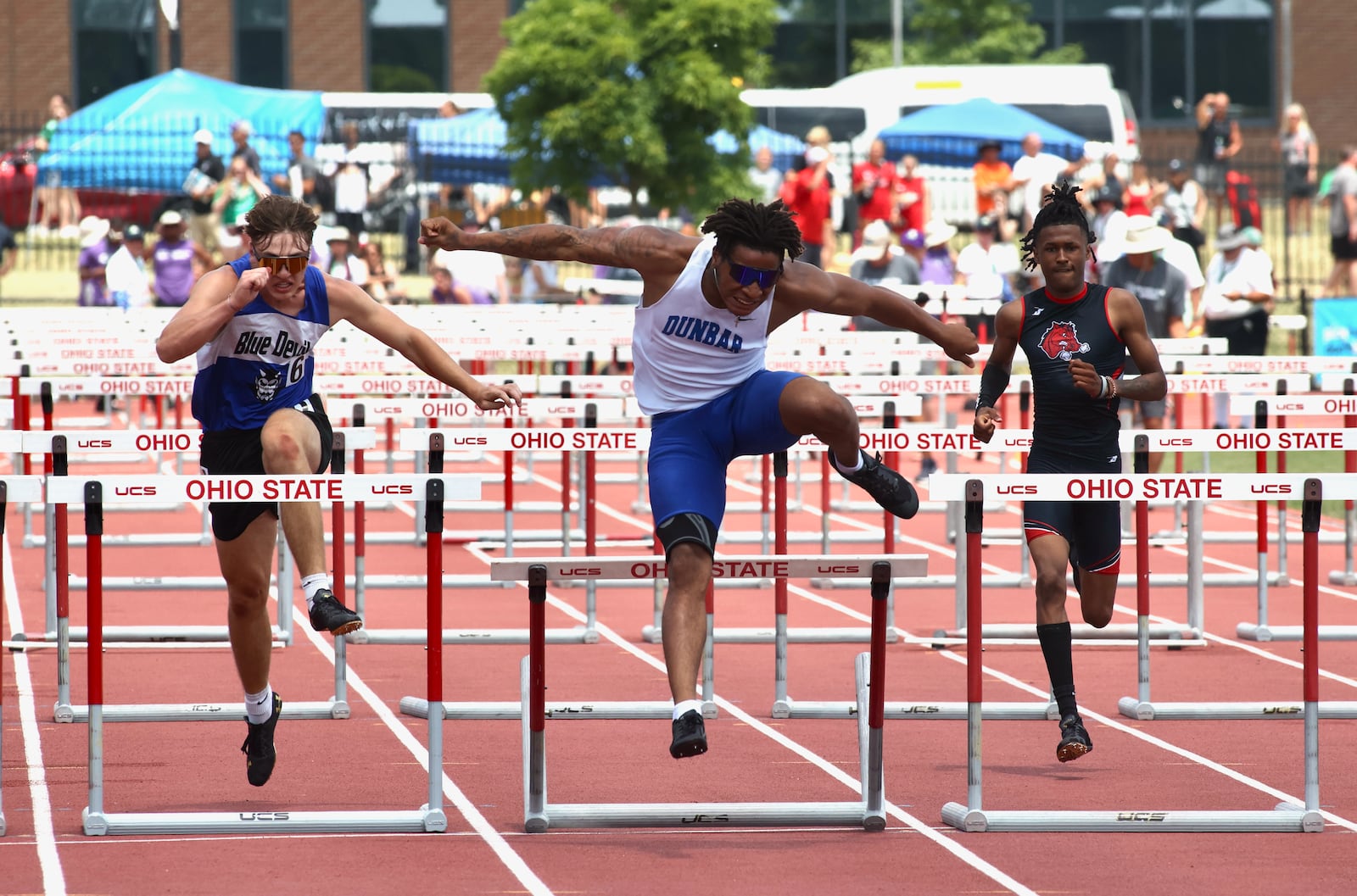 Dunbar's Dai'Vontay Young races to victory in the 110-meter hurdles at the Division II state track meet on Saturday, June 3, 2023, at Jesse Owens Memorial Stadium in Columbus, Ohio. David Jablonski/Staff