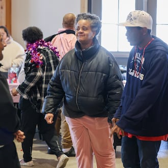 Participants dance during Goodwill Easterseals' Valentine's Dance on Thursday, Feb. 12 at Lost Creek Reserve in Troy. Goodwill Easterseals held a catered lunch, games, crafts and dancing for people with developmental disabilities, caregivers and service and support administration workers. BRYANT BILLING / STAFF