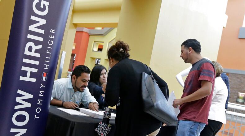 Ohio saw unemployment fall slightly in March, according to the latest state jobs report. AP Photo/Alan Diaz, File