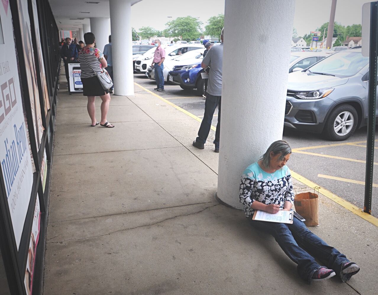 PHOTOS: Long lines as state BMV offices reopen after coronavirus shutdowns