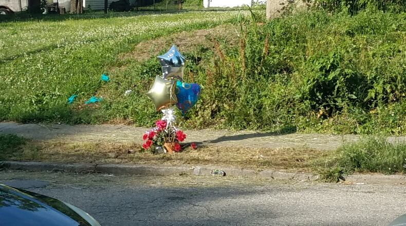 Vigil held tonight for Tevin Million, the victim of a shooting on Newport Avenue in Dayton.