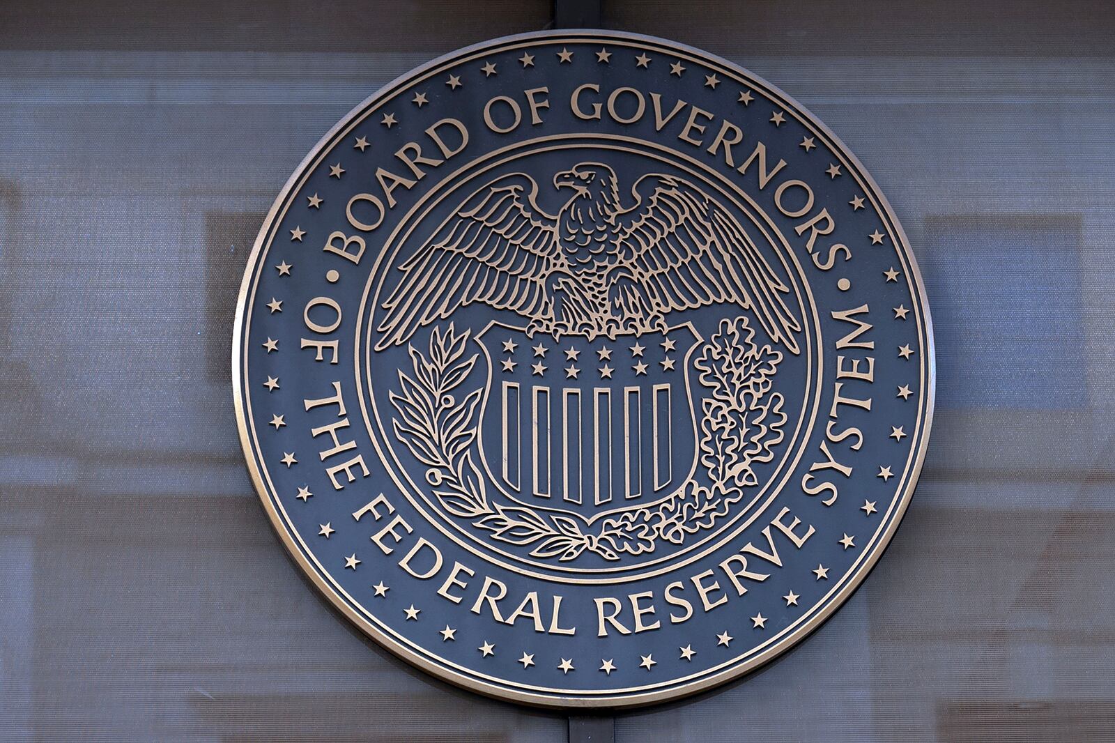 FILE - The seal of the Federal Reserve Board is seen at the Building in Washington, Saturday, Dec. 8, 2024. (AP Photo/Jose Luis Magana)