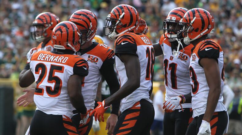 GREEN BAY, WI - SEPTEMBER 24: A.J. Green #18 of the Cincinnati Bengals celebrates after catching a touchdown pass during the first quarter against the Green Bay Packers at Lambeau Field on September 24, 2017 in Green Bay, Wisconsin. (Photo by Dylan Buell/Getty Images)