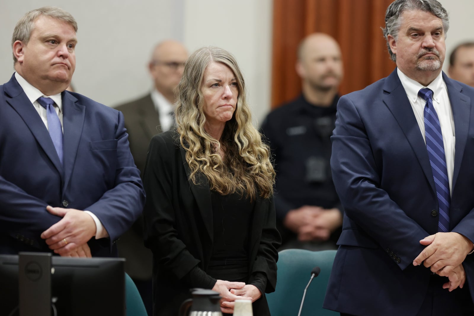 FILE - Lori Vallow Daybell stands and listens as the jury's verdict is read at the Ada County Courthouse in Boise, Idaho, May 12, 2023. (AP Photo/Kyle Green, File)