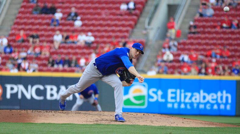 Cubs starter Kyle Hendricks pitches against the Reds on Tuesday, May 14, 2019, at Great American Ball Park in Cincinnati. David Jablonski/Staff
