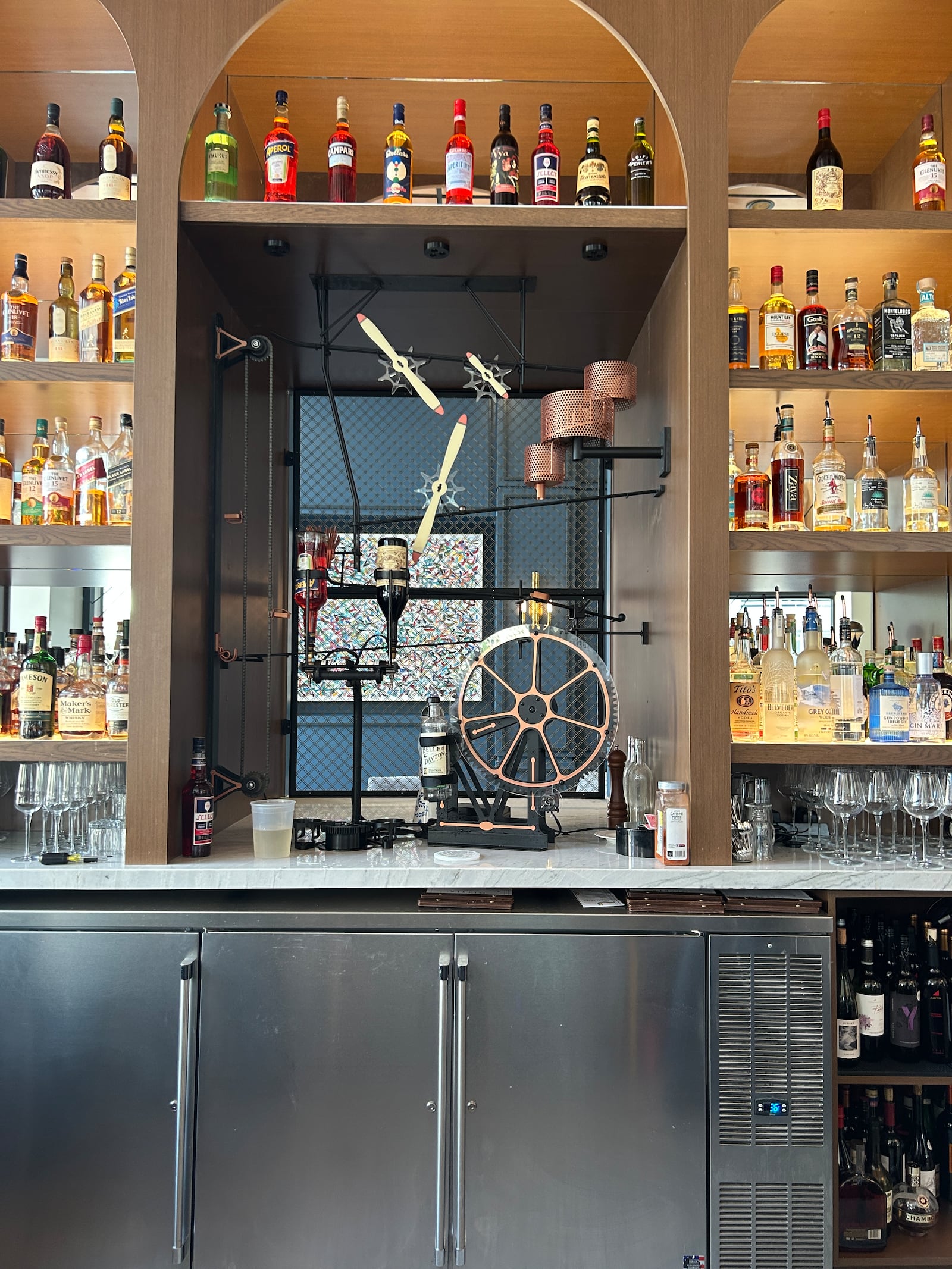 Hotel Ardent design pays tribute to Dayton’s history of innovation. Dayton inventions are on display at the front desk. An NCR cash register is displayed in the private dining room. Guestrooms feature framed patents. A Rube Goldberg-like "Negroni Machine" makes cocktails with a press of a button. CONTRIBUTED/HANNAH KASPER