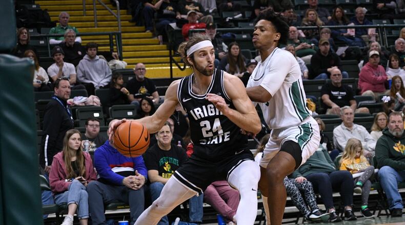 Wright State's Tim Finke drives baseline past a Green Bay player during Saturday night's game at the Nutter Center. Wright State Athletics photo