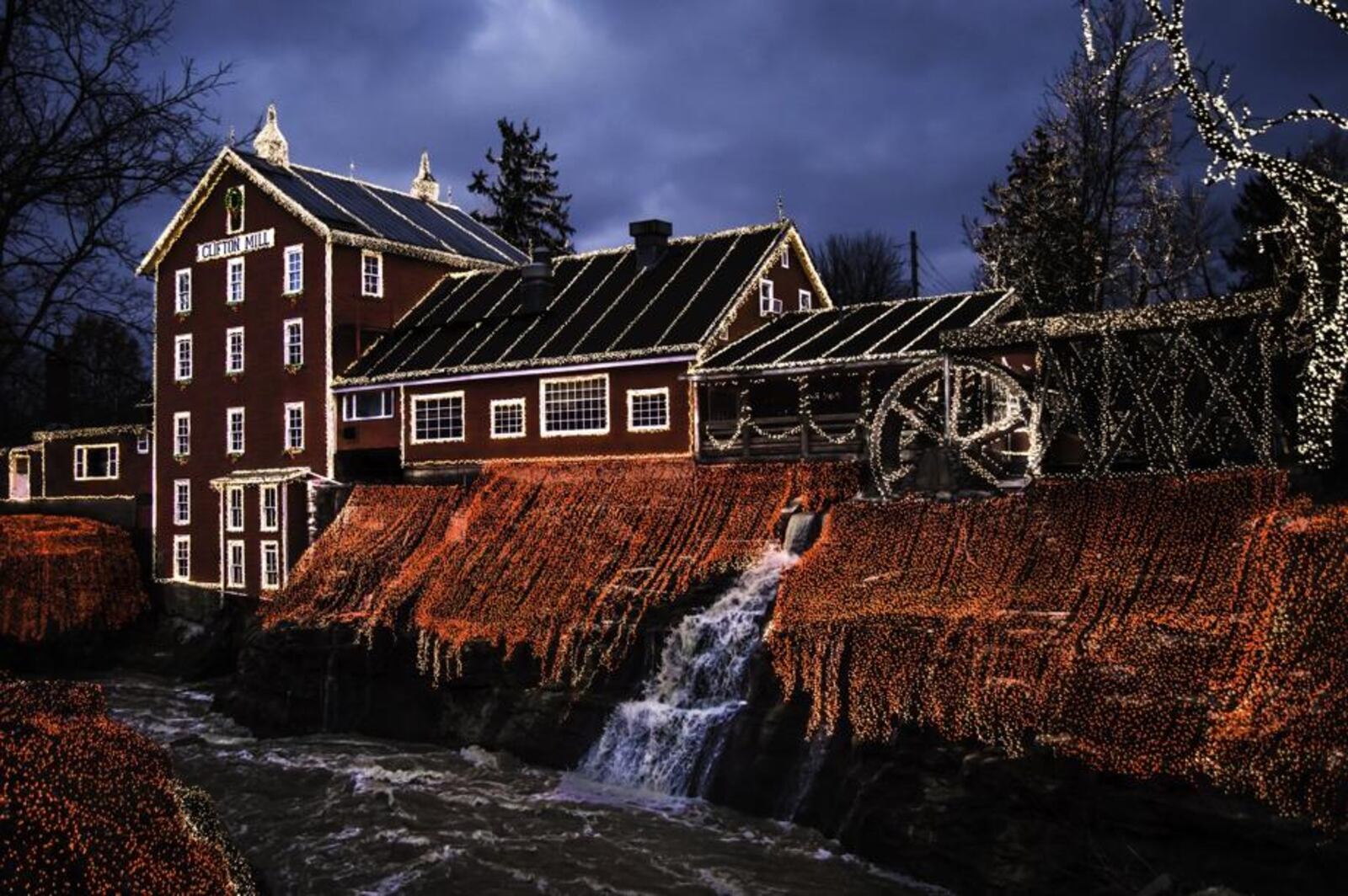 The Legendary Lights at the Historic Clifton Mill drapes their scenic features   cliffs, gorges, a covered bridge   in four million brilliant lights