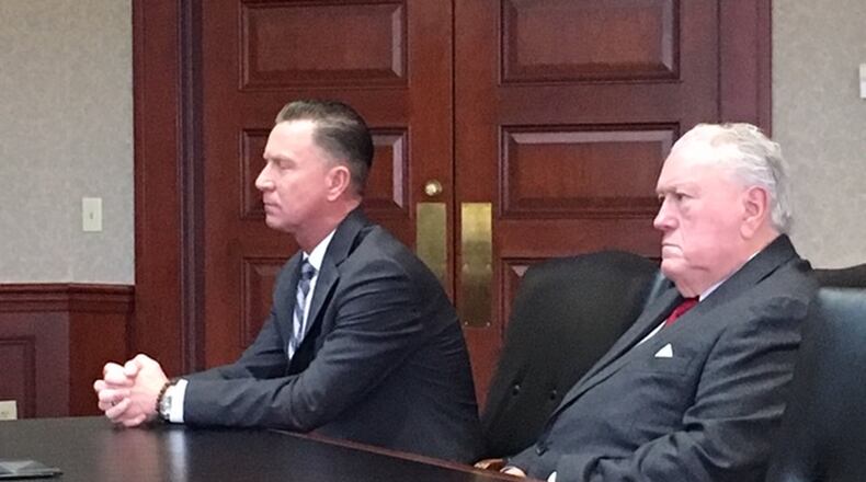 Jeff Couch, left, who is accused of assaulting his wife in March, was in Butler County Common Pleas Court Monday for a pre-trial hearing with his attorney R. Scott Croswell III,