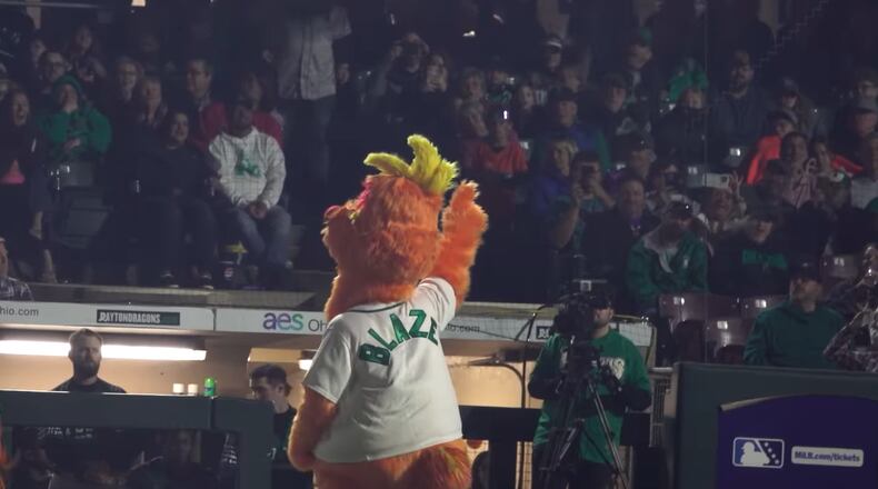 Blaze is a fluffy orange figure who has joined Heater, the Dayton Dragons mascot, for the team's celebration of 25 seasons during 2025. CONTRIBUTED