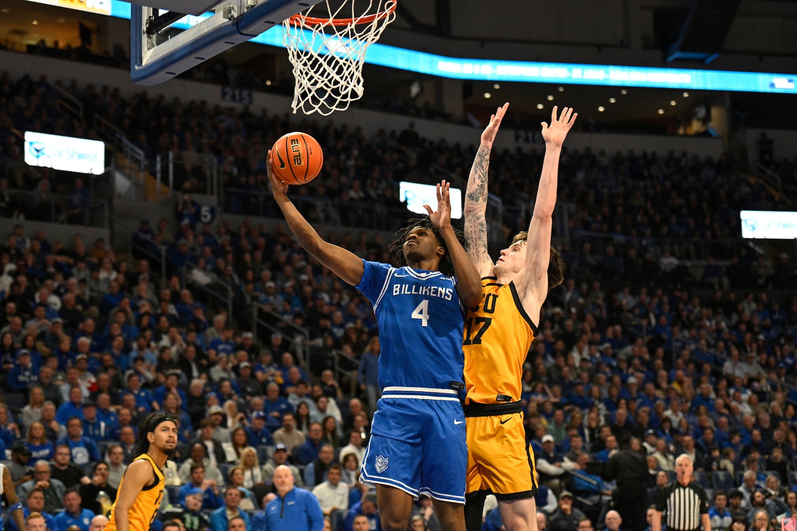 Virginia Commonwealth's Lazar Djokovic (17) defends against Saint Louis' Amari McCottry (4) during the second half of an NCAA college basketball game, Friday, Feb. 20, 2026, in St. Louis. (AP Photo/Lexie Knight)