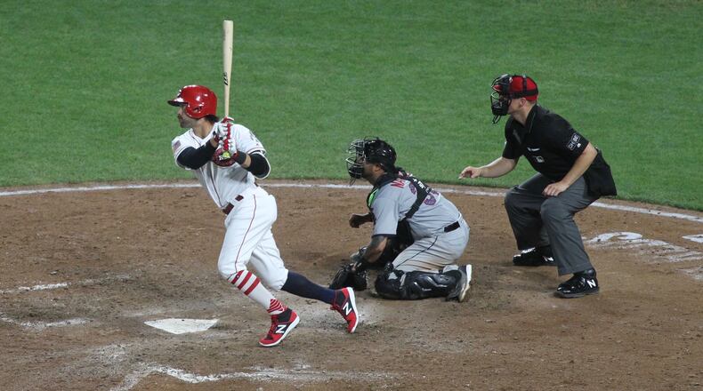 The Reds’ Alex Blandino doubles in the eighth to score the go-ahead runs against the White Sox on Monday, July 2, 2018, at Great American Ball Park in Cincinnati. David Jablonski/Staff