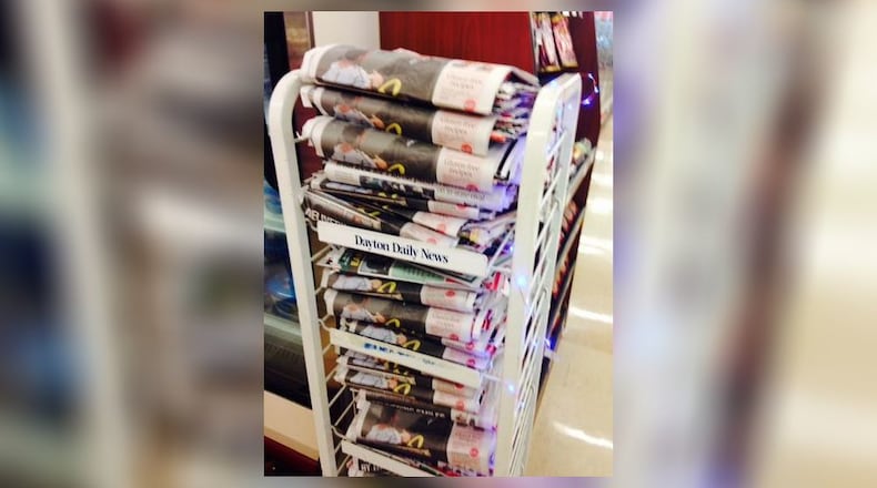 Dayton Daily News editions on the newsstand. Staff file photo