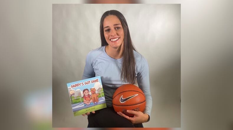 University of Dayton women's basketball player Jenna Giacone and the children's book she wrote, "Gabby's Got Game." CONTRIBUTED