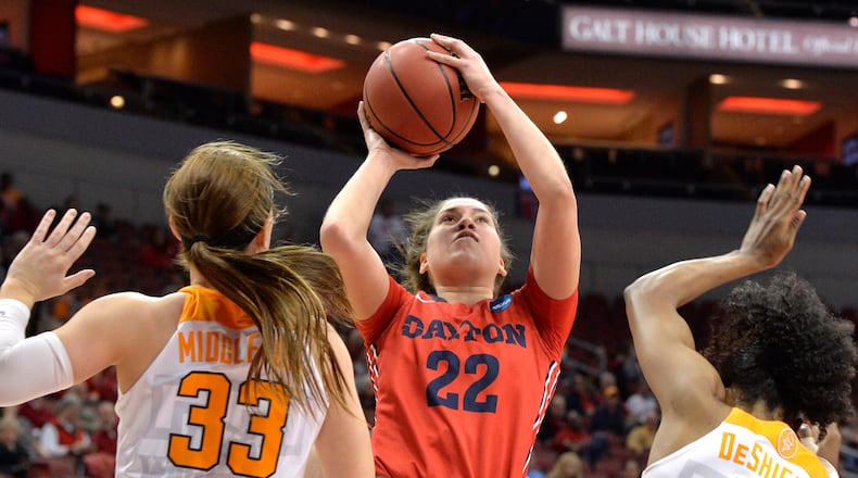 Dayton’s Kelley Austria (22) attempts to shoot between Tennessee’s Alexa Middleton (33) and Diamond DeShields (11) in the first half of a first-round game in the women’s NCAA college basketball tournament, Saturday, March 18, 2017, in Louisville, Ky. (AP Photo/Timothy D. Easley)