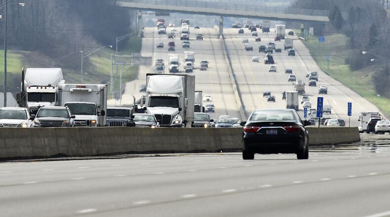 Holiday travel will break records, but roadways may not be as congested. NICK GRAHAM/STAFF