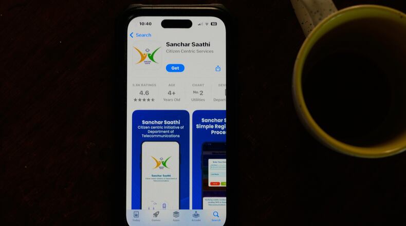 An Indian government-run cybersecurity app "Sanchar Saathi" is seen on a mobile phone in New Delhi, India, Tuesday, Dec. 2, 2025. (AP Photo/Manish Swarup)