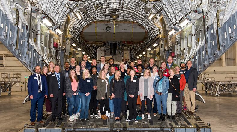 Leadership Dayton members tour a U.S. Air Force C-17 Globemaster III, operated by the 445th Airlift Wing, April 13 at Wright-Patterson Air Force BasE. Leadership Dayton was designed to identify, educate and motivate a network of local leaders and increase their capacity to serve the Dayton region. U.S. AIR FORCE PHOTO/JAIMA FOGG