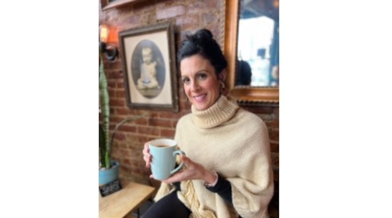 Erica Paulson at Ghostlight Coffee in 2023. She has grown to embrace the Dayton community, to which she moved in 2017. CONTRIBUTED