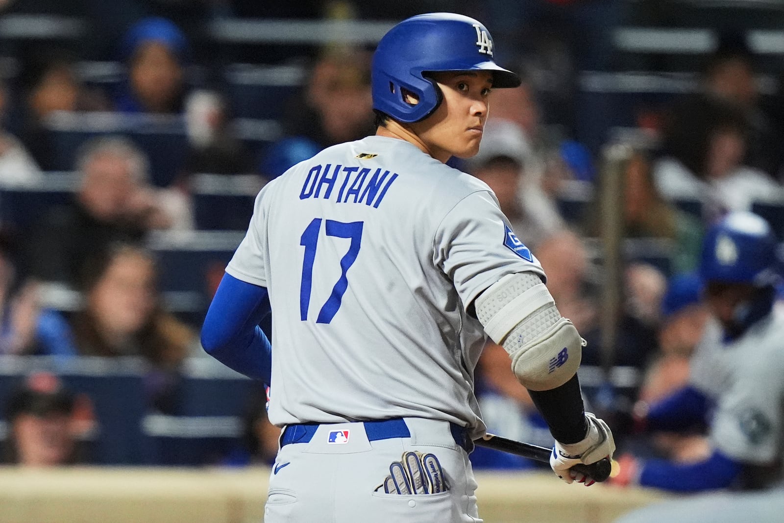 Los Angeles Dodgers' Shohei Ohtani, of Japan, reacts after striking out during the eighth inning of a baseball game against the New York Mets Saturday, May 24, 2025, in New York. (AP Photo/Frank Franklin II)