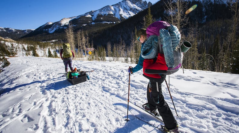 Katie Berning, left, and Julia Ben - Asher of Steamboat Springs begin their trek into the Noku Crags Sunday, Dec. 10, 2017, in State Forest State Park. They were making the two-mile hike to the Nokhu Hut to spend a couple nights. The hut is one of several structures in the park managed by Never Summer Nordic. (Christian Murdock/The Gazette/TNS)