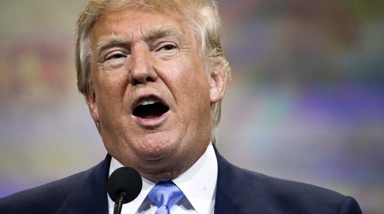 FILE - In this April 10, 2015, file photo, Donald Trump speaks at the National Rifle Association convention in Nashville, Tenn. With a presidential field approaching 20 high-profile Republicans, the GOP’s 2016 class offers voters a little bit of everything. There are the top-tier candidates, the single-issue candidates and even the quixotic dreamers. And then there’s Trump. The Donald, as he’s commonly known as a celebrity, will announce his 2016 intentions on Tuesday at a Manhattan skyscraper that bears his name. (AP Photo/Mark Humphrey, File)