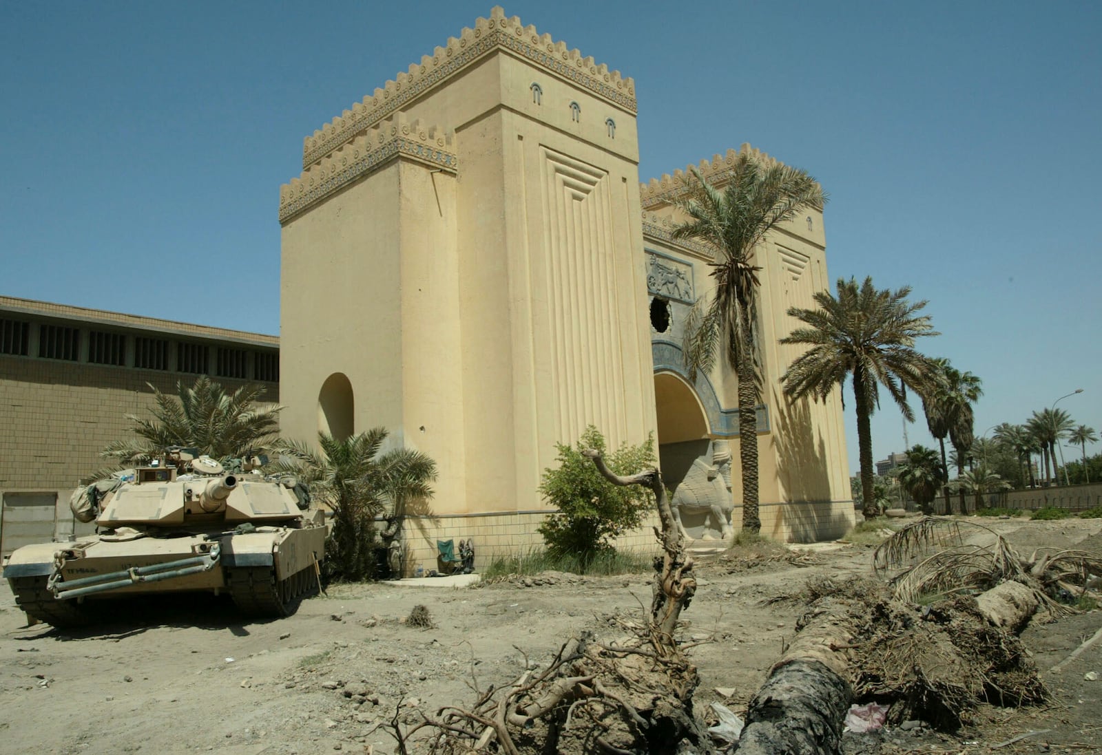 FILE - A U.S. Army tank is parked outside the Iraqi National Museum in Baghdad on May 6, 2003. (AP Photo/Murad Sezer, File)