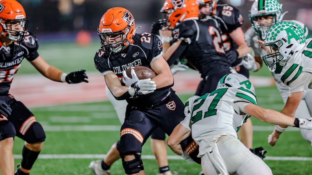 The Coldwater High School football team beat Anna 14-12 on Friday, Nov. 21 at Piqua's Alexander Stadium to win the Division III, Region 12 championship. MICHAEL COOPER / STAFF PHOTO