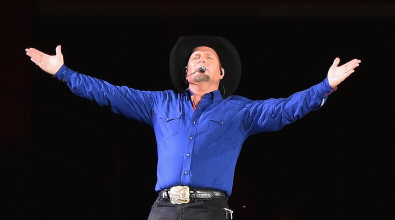 HOT TICKET: Country music icon Garth Brooks and his wife Trisha Yearwood are bringing their world tour to the region. The duo will perform at Bankers Life Fieldhouse in Indianapolis Saturday, Oct. 7 at 7:30 p.m., with tickets going on sale Friday, Aug. 25 at 10 a.m. Tickets are $74.98 and all seats are sold on a best-available basis. There is a purchase limit of eight tickets.. (Photo by Theo Wargo/Getty Images)