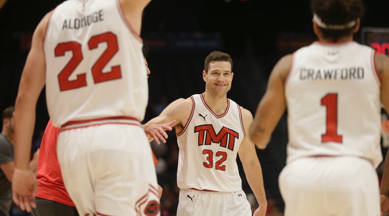Jimmer Fredette smiles after making a game-ending shot for The Money Team in a victory against Men of Mackey in the second round of The Basketball Tournament on Tuesday, July 26, 2022, at UD Arena in Dayton. David Jablonski/Staff