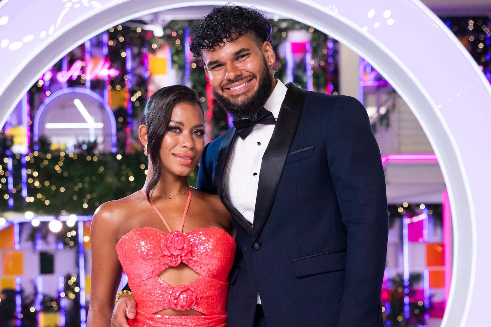 This image released by Peacock shows winning couple Amaya Espinal, left, and Bryan Arenales on the reality dating series "Love Island USA." (Ben Symons/Peacock via AP)