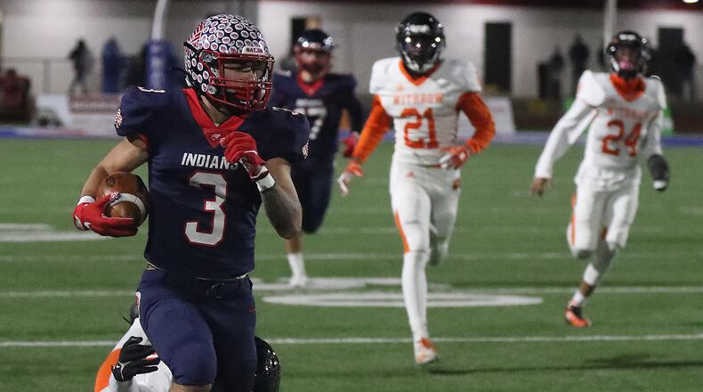 Piqua's Jasiah Medley breaks free down the sideline for a first down against Withrow during a Division II, Region 8 playoff game on Nov. 5, 2021. BILL LACKEY/STAFF