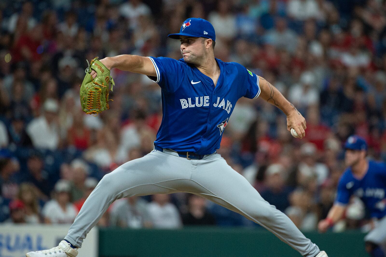 Toronto Blue Jays relief pitcher Mason Fluharty delivers against the Cleveland Guardians during the 10th inning of a baseball game, Wednesday, June 25, 2025, in Cleveland. (AP Photo/Phil Long)