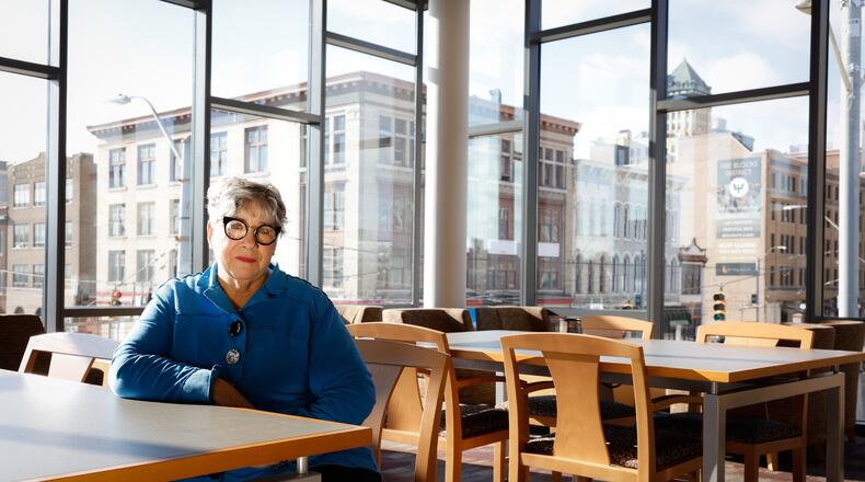Former DPS teacher, Joni Watson, took early retirement from her teaching job because of COVID-19 stress.  She's working again part-time for the Brunner Literacy Center. JIM NOELKER/STAFF