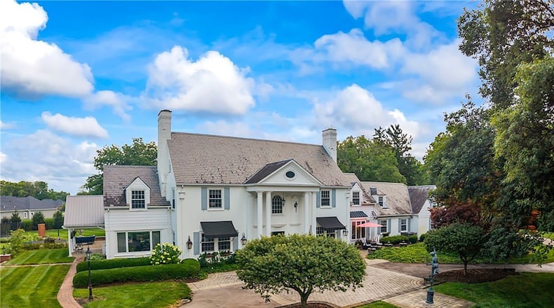 This historical Troy estate home sits on six acres and has a circular driveway that flows past the front of the home, which features a two story covered entry with pillars. The home has been mostly renovated. CONTRIBUTED