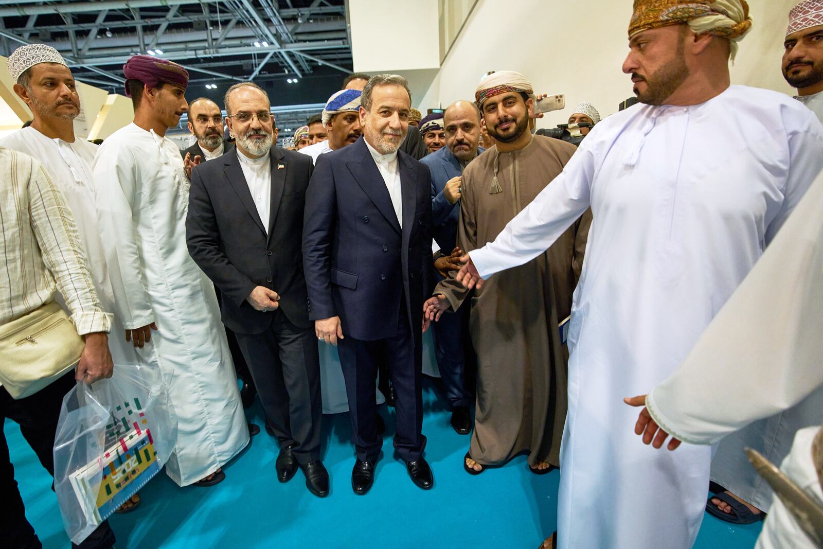 Iranian Foreign Minister Abbas Araghchi, visits the Muscat International Book Fair in Oman, Friday, April 25, 2025. (AP Photo/ Fatima Shbair)