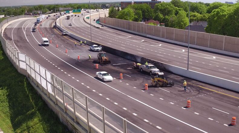 ODOT crews began to repair I-75 in Dayton on Monday after a fiery fatal crash closed the highway in April 2017. A wrong-way driver crashed, head-on, with a gasoline tanker which caught fire. TY GREENLEES / STAFF
