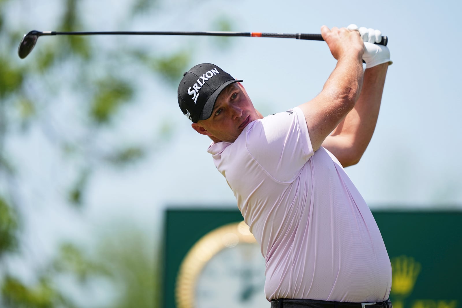 Sepp Straka, of Austria, watches his shot on the first hole during the final round of the Truist Championship golf tournament at the Philadelphia Cricket Club, Sunday, May 11, 2025, in Flourtown. (AP Photo/Matt Rourke)