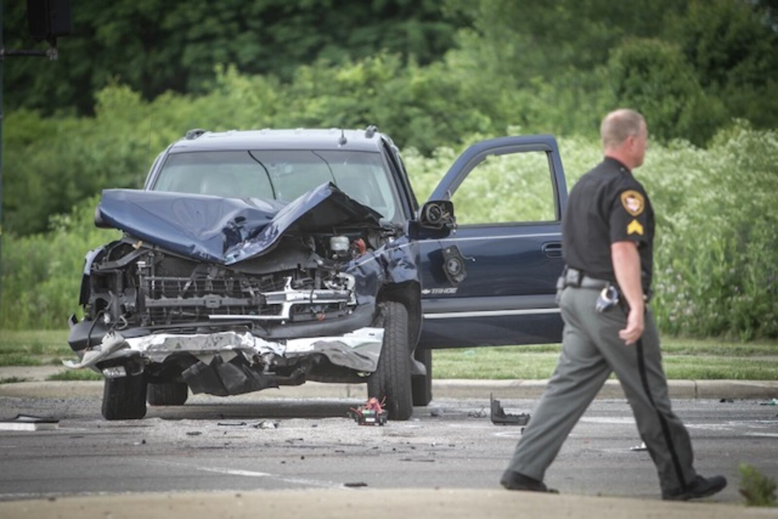 Three people, including one who was ejected, were injured Wednesday, June 13, 2018, in a vehicle crash on Turner Road in Harrison Twp. (Jim Noelker/Staff)
