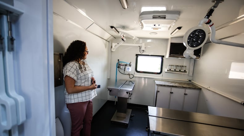 P.I.O. and Business Services for the Animal Resource Center, Kara Hamby stands in the mobile animal surgical lab at the center Monday May 9, 2022. Because of COVID-19, the last few years, the mobile clinic has had limited use but the center plans to visit multiple events in 2022. JIM NOELKER/STAFF