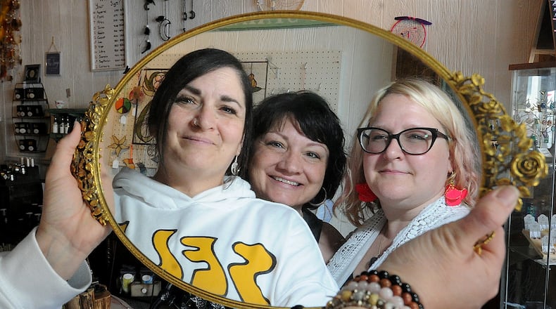 Jennifer Ferrell, Billie Carrico and Tracy Heppes, co-founders of Eclectic Essentials in downtown Xenia. MARSHALL GORBY\STAFF