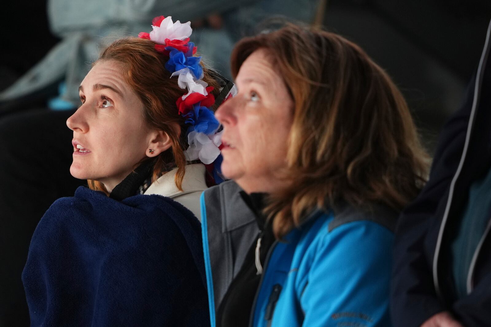 Fans watch the first round match of the French Tennis Open between France's Arthur Fils and Chile's Nicolas Jarry, at the Roland-Garros stadium, in Paris, Monday, May 26, 2025. (AP Photo/Lindsey Wasson)
