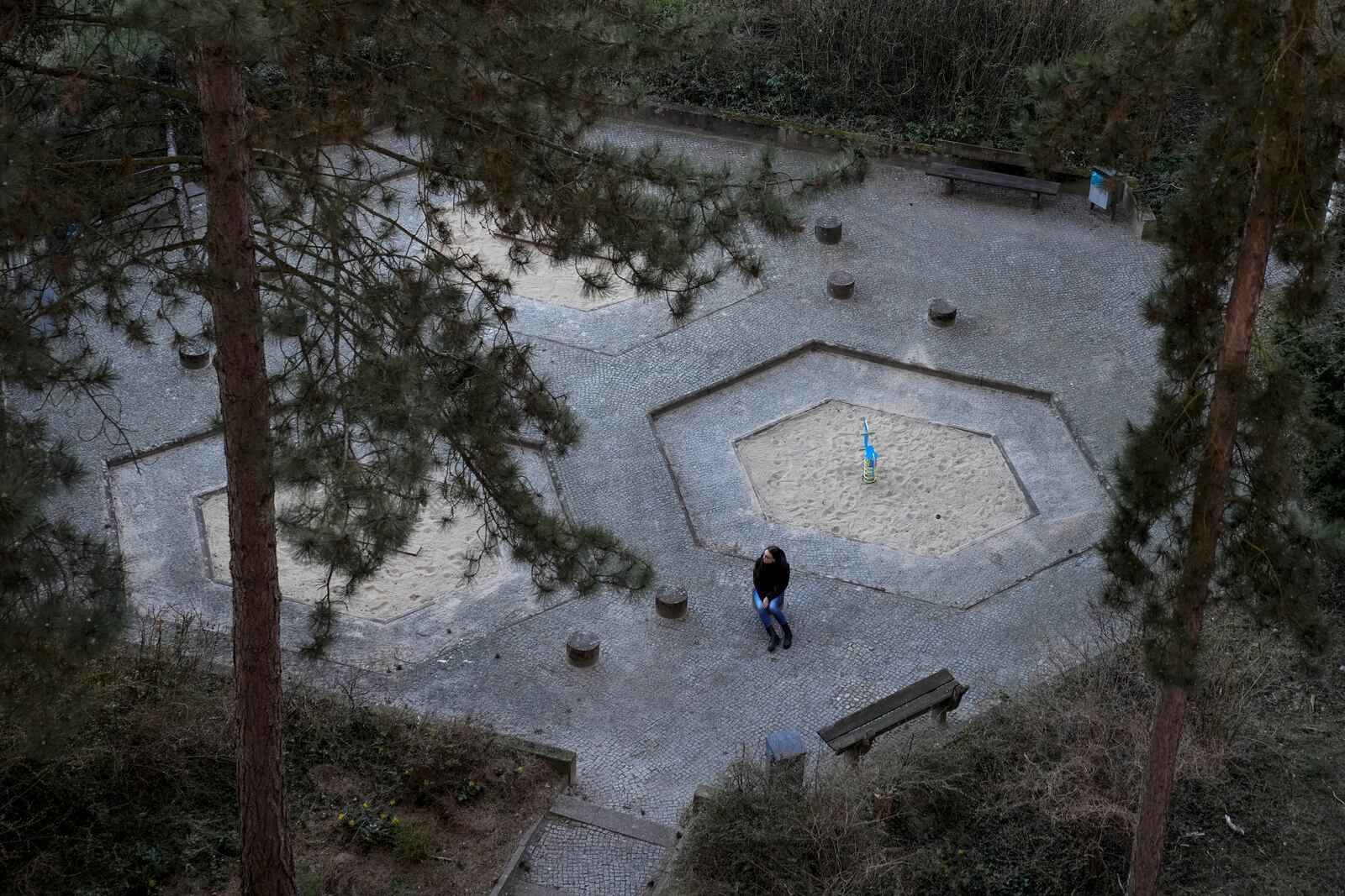 Liusiena Zinovkina, 32, sits in a park in Berlin, Germany, on March 19, 2025. Her husband, Kostiantyn, was arrested in Ukraine in May 2023 and remains in Russian custody. She left Ukraine after the war began. (AP Photo/Ebrahim Noroozi)