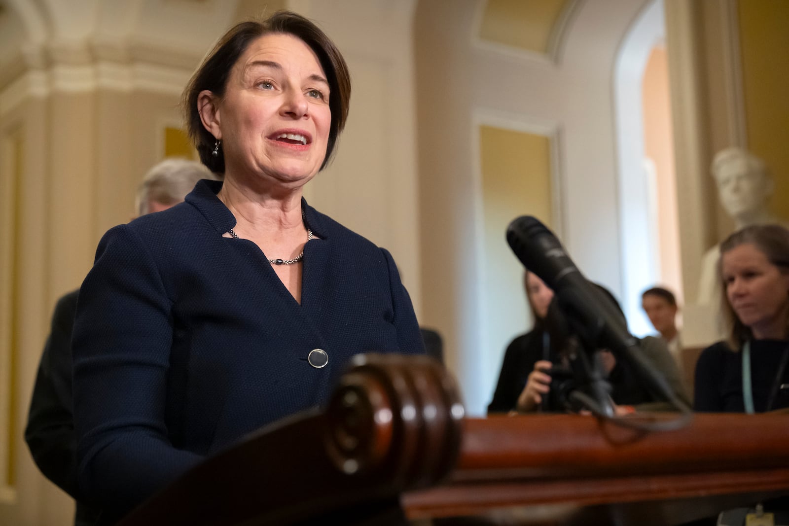 FILE - Sen. Amy Klobuchar, D-Minn., speaks with reporters on Capitol Hill, Dec. 3, 2024, in Washington. (AP Photo/Mark Schiefelbein, File)