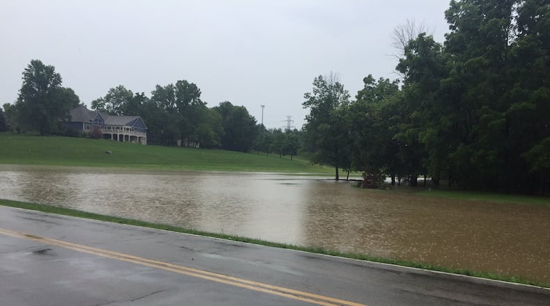 Flooding occurred on Tipp City’s Canal Road on Thursday afternoon. Miami County was one of six local counties to experience flood warnings on Thursday.
