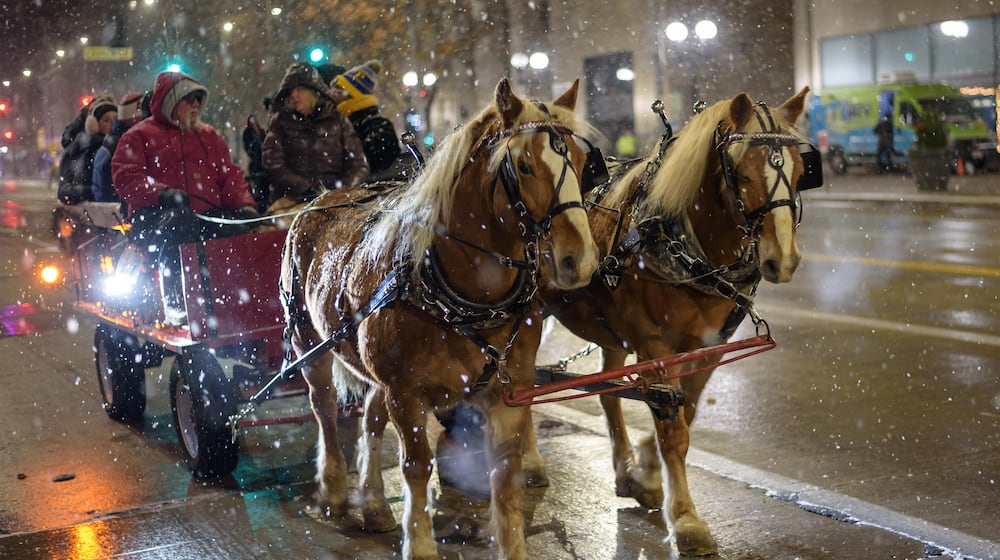 The 52nd annual Dayton Holiday Festival featuring the Grande Illumination and Dayton Children’s Parade Spectacular in Lights, happened in downtown Dayton on Friday, Nov. 29, 2024. TOM GILLIAM / CONTRIBUTING PHOTOGRAPHER