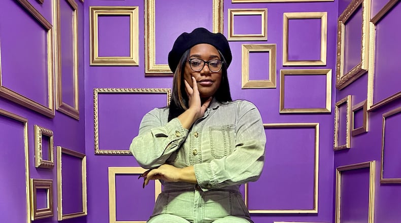 NaAsiaha Simon of Dayton, photographed in the Atlanta Selfie Museum, plans to open the Gem City Selfie Museum this summer in the Oregon District. CONTRIBUTED / NAASIAHA SIMON